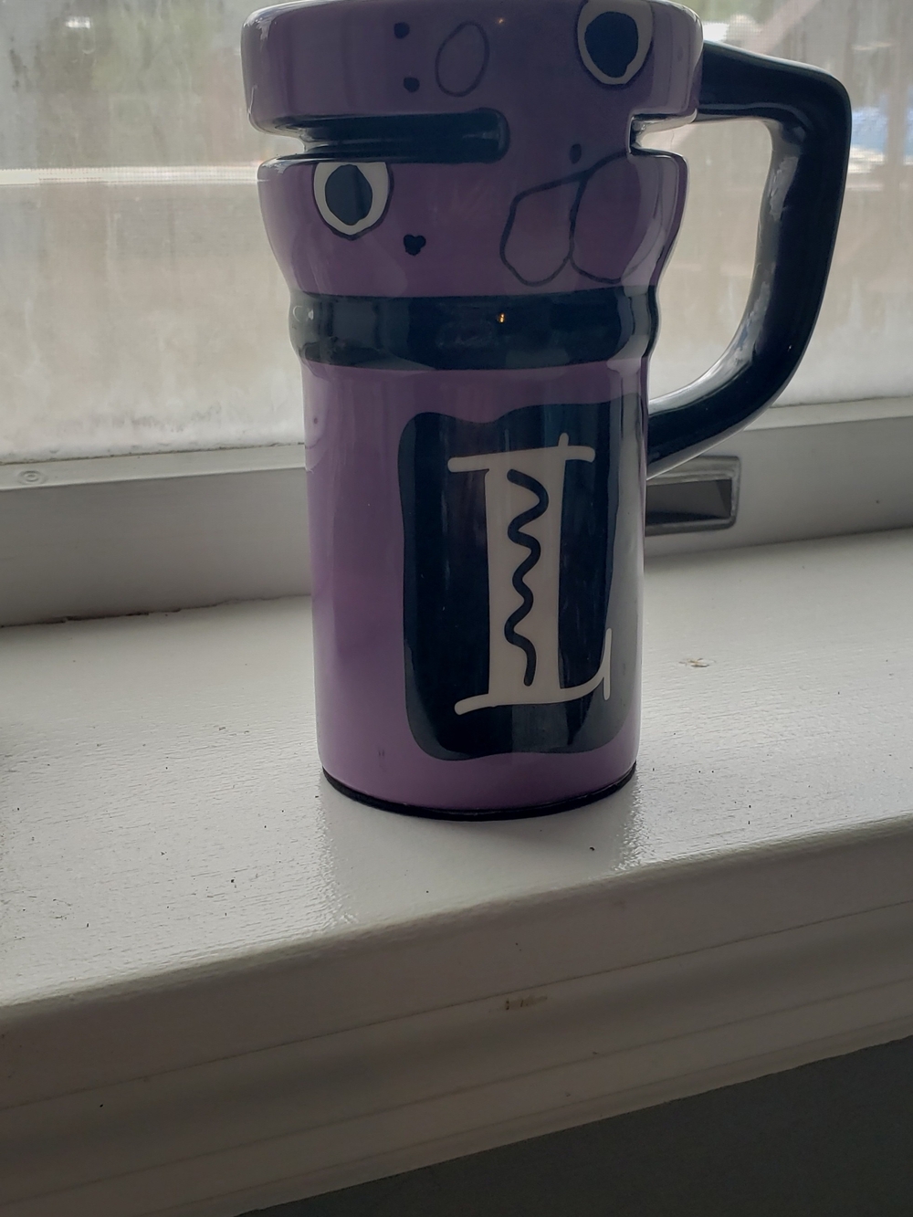 Lavender Ceramic Travel Mug with Playful Face and Black Accents Monogram L